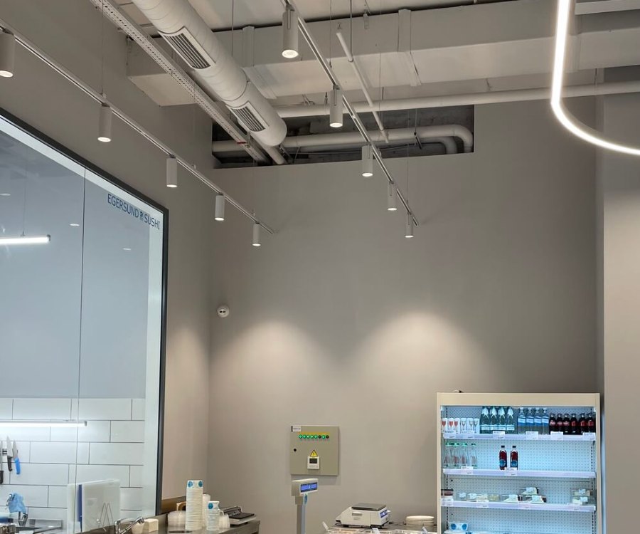 LAZY KITCHEN deli display under SHOOTER-M track spotlights