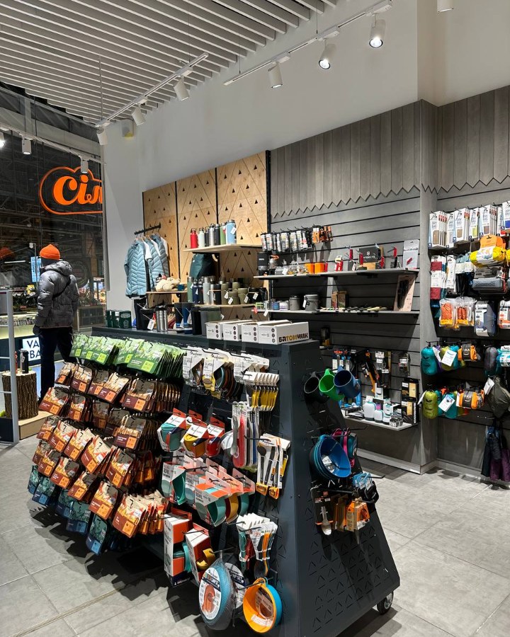 PRIAGO track spotlights above outdoor gear stands at the Gorgany store