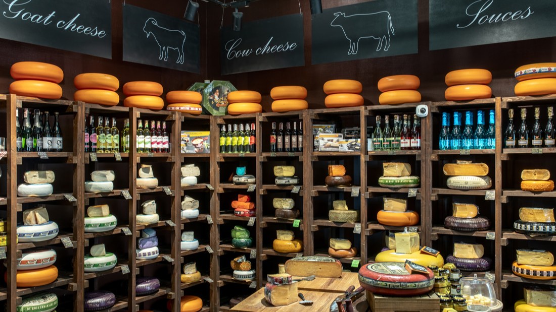 PRIAGO track spotlights above the cheese shelving at the Cheese Kingdom store
